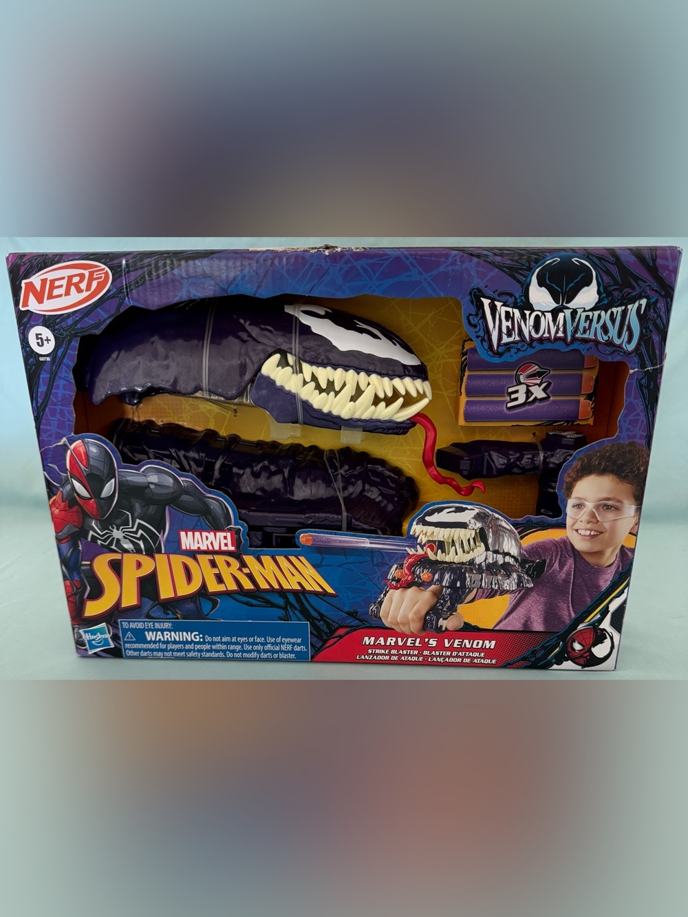 Marvel Spider-Man VenomVersus Marvel's
Venom Strike Blaster